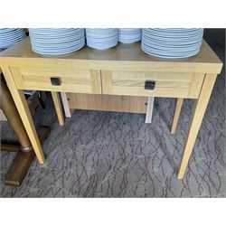 Light oak two door cabinet and a side table with two drawers- LOT SUBJECT TO VAT ON THE HAMMER PRICE - To be collected by appointment from The Ambassador Hotel, 36-38 Esplanade, Scarborough YO11 2AY. ALL GOODS MUST BE REMOVED BY WEDNESDAY 15TH JUNE.