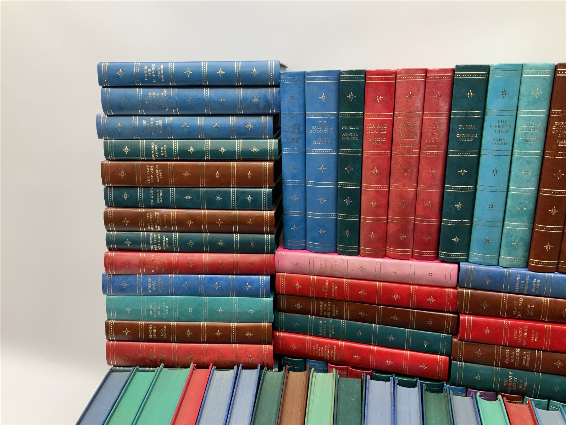 The Companion Book Club London, approximately one hundred thirty hardback novels, various titles including, Blood Sport by Dick Francis, Nemesis by Agatha Christie, The Eye of The Tiger by Wilbur Smith, etc. 