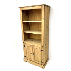 Pine open bookcase on cupboards, two shelves, platform support