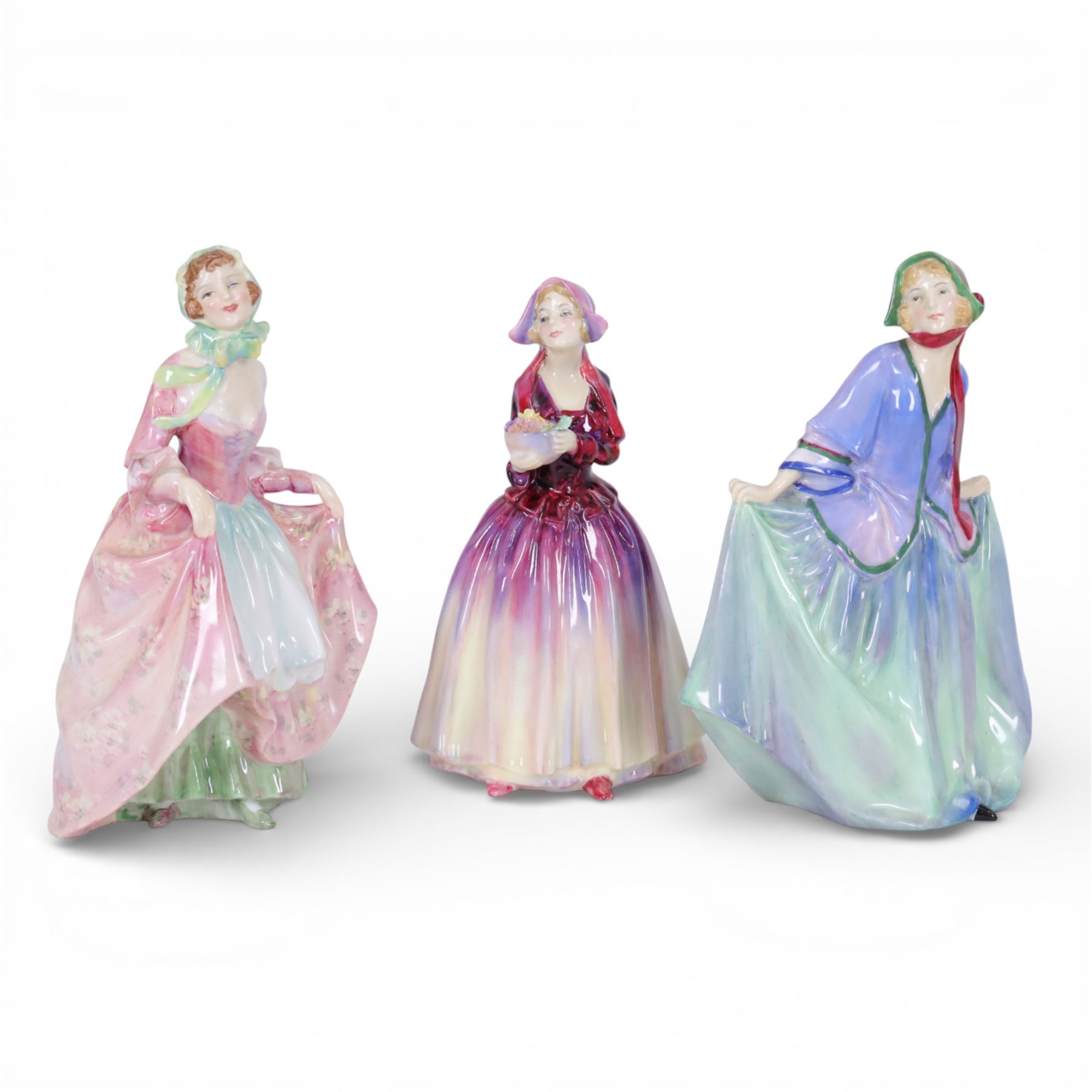 Three Royal Doulton figures, comprising Suzette HN2026, Sweet Anne HN1318 and Dorcas HN1338