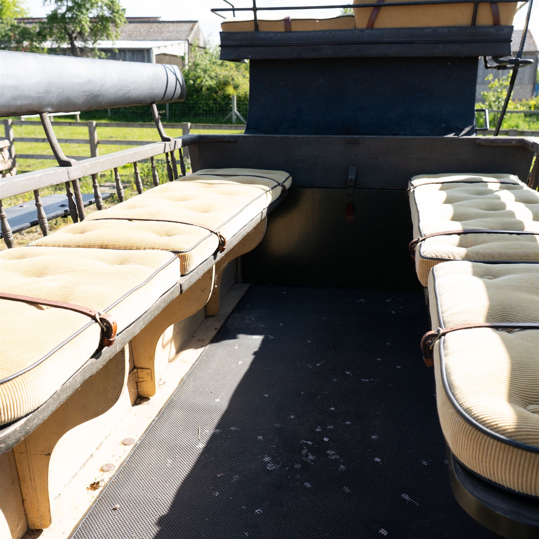 The Zetland Body Break by Peters & Sons, London

A fine and substantial late nineteenth century body break by Peters & Sons of London, circa 1880, formerly owned by the Marquis of Zetland. The carriage is finished in dark olive green and black with red, black and yellow lining, and is fitted with an elevated coachman’s box seat above a forward luggage compartment. The open rear body is entered by side doors and arranged with opposing longitudinal passenger seating.

The carriage is mounted on English pattern wooden artillery wheels with iron tyres and is carried on full elliptic springs, with a transverse helper spring behind. The front axle is fitted with fifth wheel turntable steering. The rear passenger compartment has upholstered longitudinal side benches beneath padded back rails, with turned spindle upper panels to the side doors and rear handrails. The driver’s seat is upholstered in corded fabric and secured with leather retaining straps.

Details include shaped splinter bar and turntable, folding rear step below the door with leather covered interior handle, luggage rails to either side, pole fittings for use with a pair or team of horses, and a handbrake with brake blocks operating to both rear wheels. The wheel hubs are fitted with polished hub caps engraved “Peters & Sons, London”. The exterior retains small Zetland family crests to the side panels.

The carriage has been conserved by Woods of Fairbourne Carriages Ltd and is recorded as Lot 146 in The George Shaw Collection sale, 5 November 2003, where it was catalogued as The Zetland Body Break and described as having previously been owned by the Marquis of Zetland.

Features
• Peters & Sons, London coachbuilder’s hub caps
• Known as The Zetland Body Break
• Formerly owned by the Marquis of Zetland
• Circa 1880
• Conserved by Woods of Fairbourne Carriages
• Dark olive green and black bodywork with red, black and yellow lining
• Elevated coachman’s box seat
• Forward luggage compartment
• Open rear passenger body with side doors
• Opposing longitudinal passenger seating
• Turned spindle upper panels to the side doors
• Folding rear step with leather covered interior handle
• Full elliptic spring suspension with transverse helper spring behind
• Fifth wheel turntable steering
• Handbrake with brake blocks operating to both rear wheels
• Wooden artillery pattern wheels with iron tyres
• Shaped splinter bar and pole fittings for a pair or team of horses
• Small Zetland family crests to the side panels

Provenance
The George Shaw Collection, 5 November 2003, Lot 146. Previously owned by the Marquis of Zetland.

Conservation

Conserved by Woods of Fairbourne Carriages.

Dimensions:
Overall length: 310 cm
Width: 176 cm
Height: 226 cm

Front wheel diameter: 98 cm
Rear wheel diameter: 140 cm

Seating:
Driver's box seat: 2 persons

Rear passenger compartment: Two longitudinal benches accommodating approximately 8 to 10 passengers