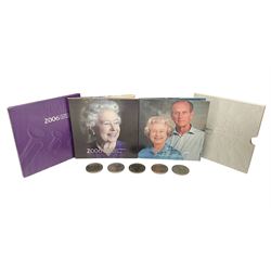 Seven Queen Elizabeth II United Kingdom five pound coins, including 2006 and 2007 in card folders, etc. 