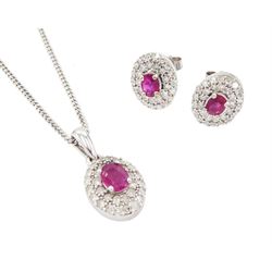 Pair of 9ct white gold oval cut ruby and round brilliant cut diamond cluster stud earrings and a matching 9ct white gold pendant necklace