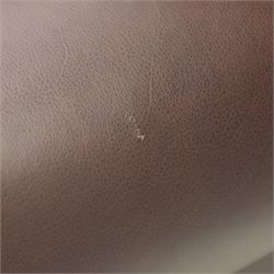 Laura Ashley - brown leather two seater sofa, loose cushion back and seat, flanked by scrolled arms upon light stained wood supports on castors