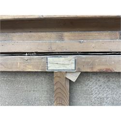 A Wilkow (Polish 19th/20th Century) Blacksmith's Workshop in a Winter Landscape, oil on canvas signed 71cm x 97cm in heavy ornate plaster gilt frame