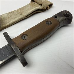 WWI British Pattern 1907 bayonet with 42cm fullered steel blade and two-piece wooden grip; various marks to ricasso including date 3-16; in leather and steel mounted scabbard with webbing frog L58.5cm overall