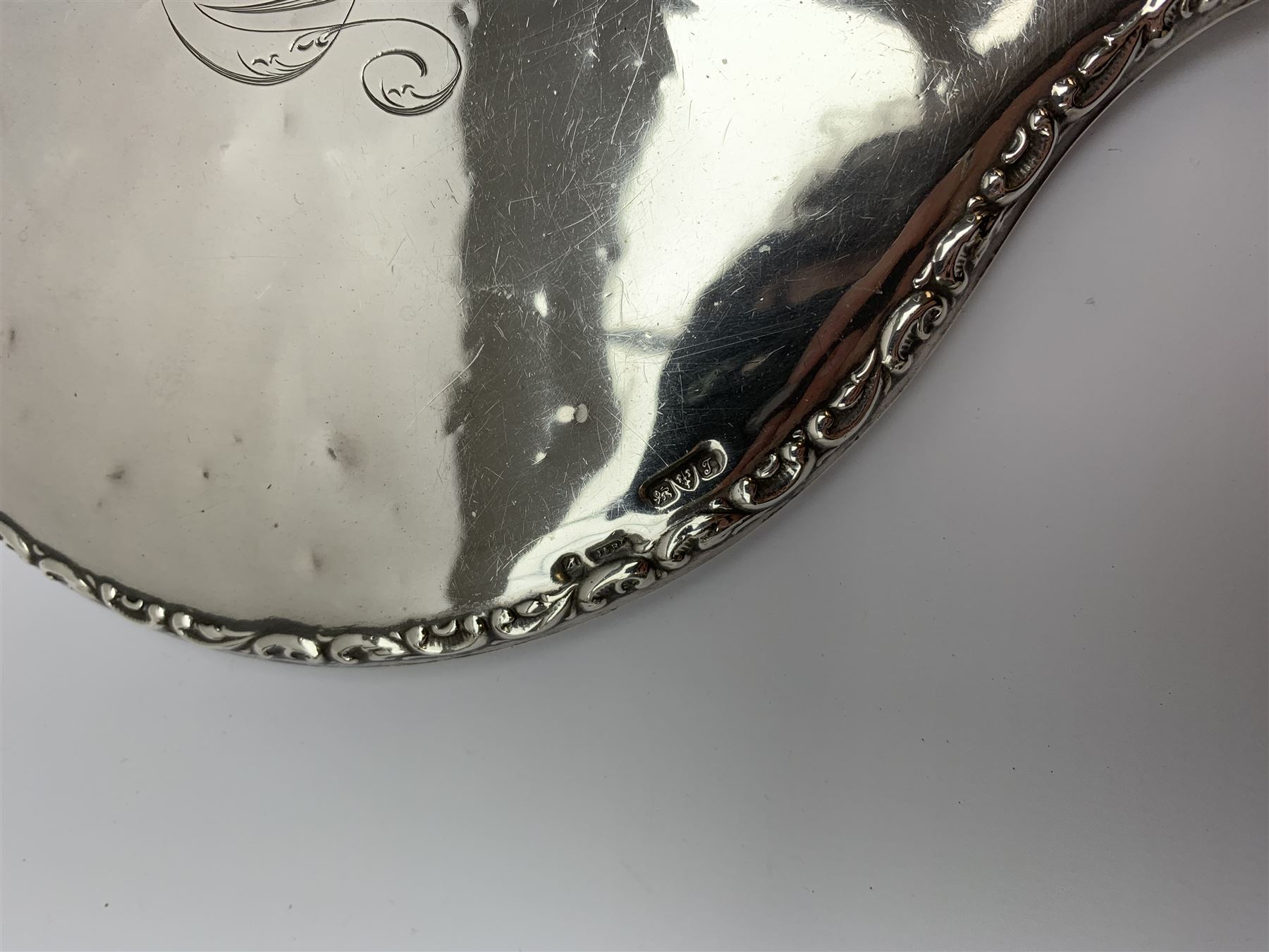 Two silver napkin rings by Collingwood & Sons Ltd, Birmingham 1928 and two other silver napkin rings hallmarked, approx 3.2oz, cased set of silver silver handled knives, hallmarked Sheffield 1915, together with a selection of silver plated flatware, to include Walker and Hall fish eaters set, cased nut cracker set with grape scissors, etc., plus a silver mounted hair brush and hand held mirror, hallmarked Chester 1919