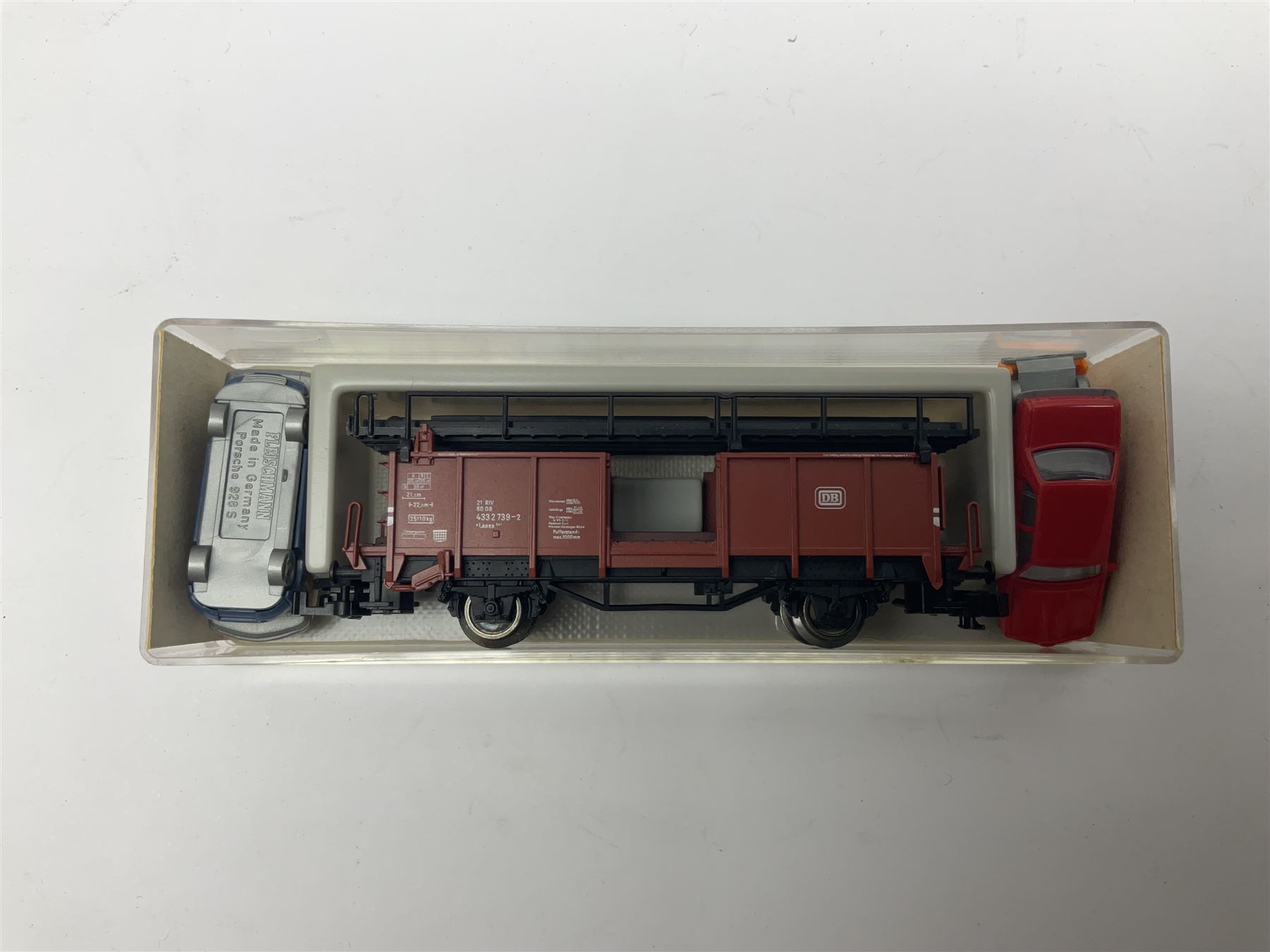 Fleischmann ‘N’ gauge ‘Piccolo’ - sixteen carriages, wagons and cars comprising nos. 8051, 8052, 8055, 8064, 8119K, 8127, 8128, 8129, 8202, 8211, 8224, 8240, 8281, 8301, 8500, 9372; along with Minitrix N503 Shock Van and 13576 6 ton Mineral Wagon; boxed and loose (18) 