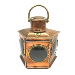 Ship's copper lamp of trapezium form with red and blue side filters and hinged front door, H22cm including brass swing handle (lacking burner)