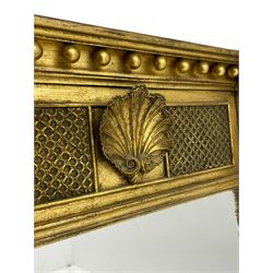 Early 19th century giltwood and gesso pier mirror, projecting moulded cornice decorated with globular mounts, the frieze with central shell motifs within latticework, flanked by two arched niches decorated with figures, spiral turned uprights enclosing plain mirror plate, paper label to the reverse inscribed 'B. L. LECAND, Carver, Gilder, Paper Hanger [...]'