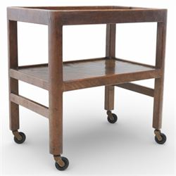 Yorkshire oak dark stained tea trolley, adzed two tier table, raised on castors