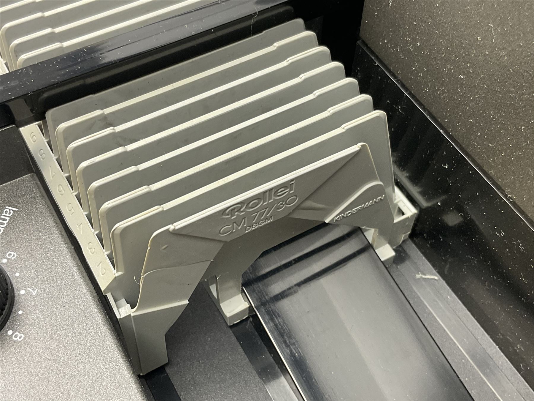 Cased Rollei projector together with a palar projector screen, autofocus slide projector and cenei scoper 360 