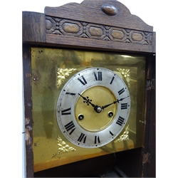  20th century oak cased mantel clock, twin train movement, striking half hours on a coil, (W25cm, H40cm, D23cm) and a Dutch postal dial wall clock, single weight movement (2)  