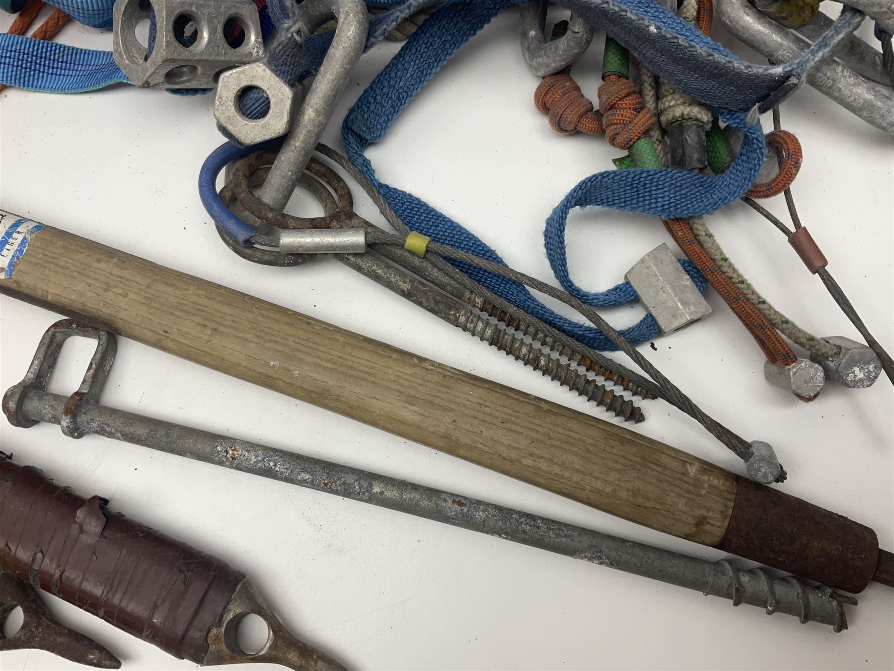 Collection of 1960s/70s climbing equipment including two original Hamish McInnes Pterodactyl ice axes, Joe Brown helmet, carabiners, ropes and wires etc