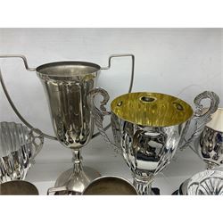 Collection of silver plated and metal trophy cups and winners plaques, all relating to the Burniston and District Show, most engraved with competitions and winner's names, in three boxes 