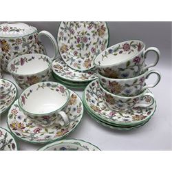 Minton Haddon Hall pattern tea service for twelve place settings, to include teapot, sugar bowl, milk jug, twelve cups and saucers and twelve dessert plates (39)