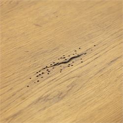 Traditional oak refectory dining table, fitted with draw leaves to either end extending to 257cm, on twin turned and block supports united by a stretcher, terminating in shaped trestle feet