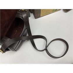 Miscellaneous shooting accessories - W.J. Bowman & Sons clay pigeon launcher; two leather cartridge belts; three cartridge bags; two canvas/leather game bags; and two metal/wooden cartridge boxes