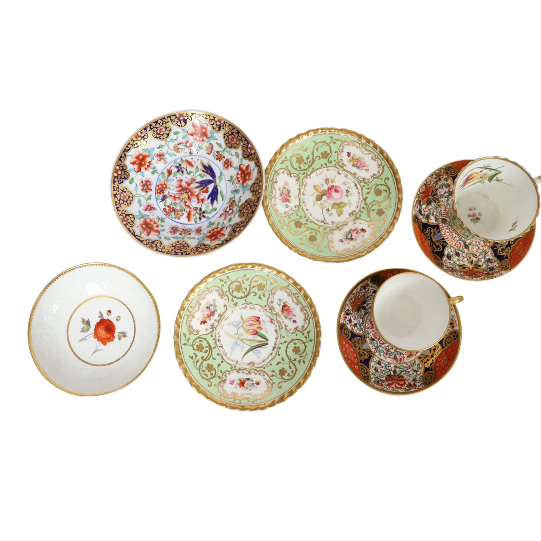 Group of 19th century tea and coffee wares, comprising two Davenport Imari 3545 pattern tea cups and saucer, one example upon three stylised bun feet, H5.5cm, a pair of Chamberlain's Worcester cabinet cups and saucers, hand painted with reserves of floral sprays and sprigs against an apple green ground, H7cm, a large size Chamberlain's Worcester cup and saucer with Imari type decoration and cobalt blue band to rim, H7.5cm, Chamberlain's Worcester cup and saucer with moulded floral band detail, and two further cups
