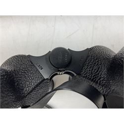 Cast metal nutcracker, in the form of a dog together with a pair of Swift Saratoga 8x40 binoculars in leather case and a hip flask, the glass flask covered in leather to the top with a detachable silver plated cup to base