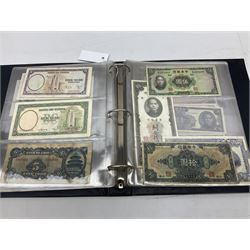 World banknotes, including Queen Elizabeth II The States of Jersey one pound 'DB202703', five pounds 'BB527762' and ten pounds 'AB651481', reserve bank of New Zealand two dollars '1L3 741894', King George V Straits Settlements one dollar 1st January 1935 'F/83 28924', various Bank of England notes etc, housed in two ring binder albums