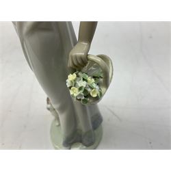 Two Lladro figures, comprising Garden Classic, no 7617 and Garden Song, no 7618, with original boxes and artists signature beneath, largest example H23cm