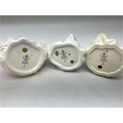 Three Royal Doulton figures, comprising Faith HN4151, Hope HN4097 and Charity HN4243, together with a horse and foal figure group