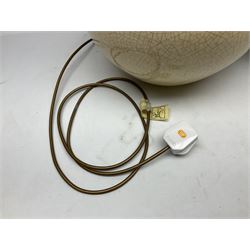 Large cream crackle glaze table lamp, together with a tall studio pottery vase in green with single loop handle, with impressed makers mark, H49cm