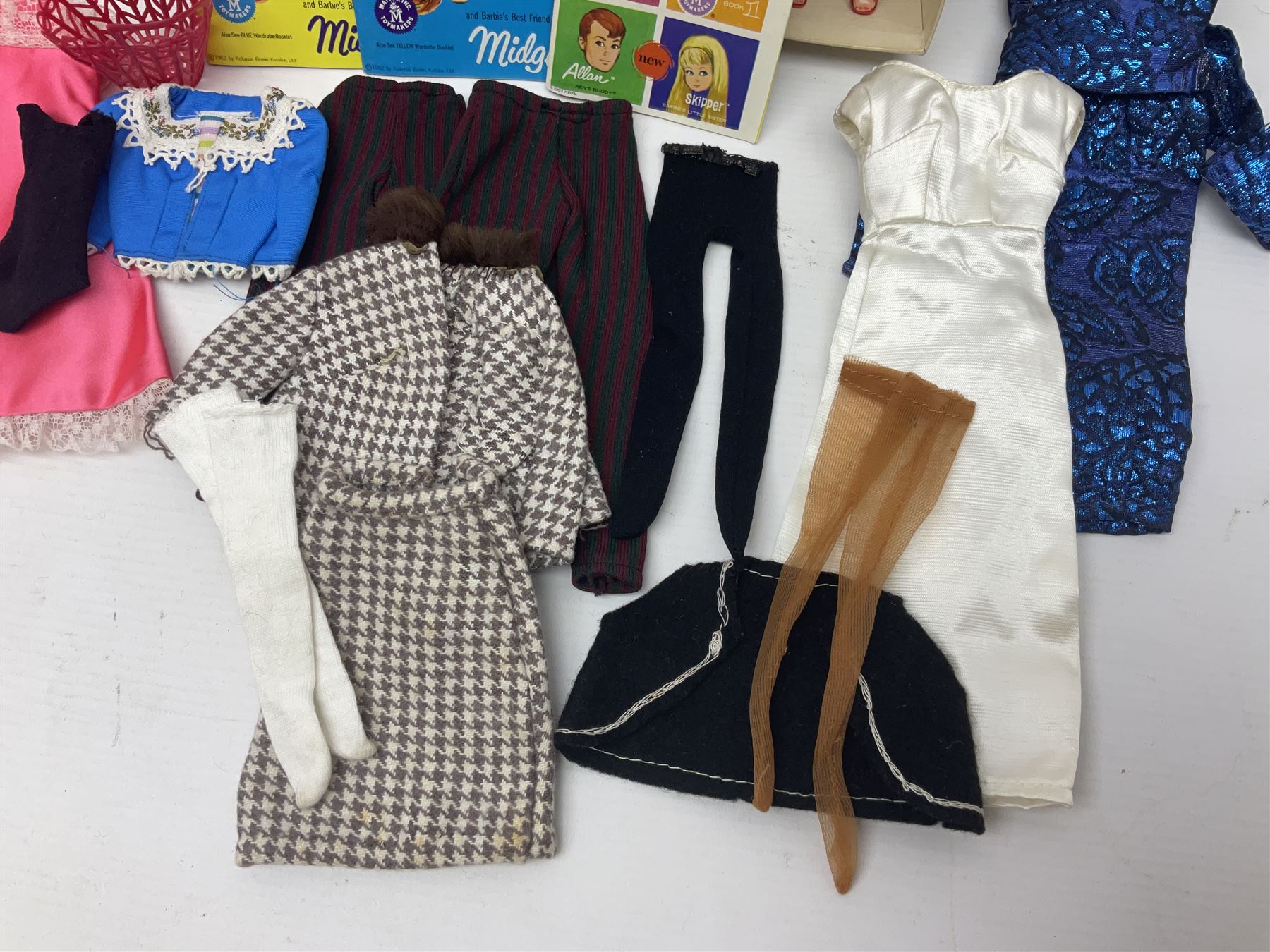 Two 1960s Mattel Barbie fashion dolls - 'Ski Queen' and 'Career Girl'; each in original decorative box with paperwork; and a quantity of Mattel and other fashion doll clothing