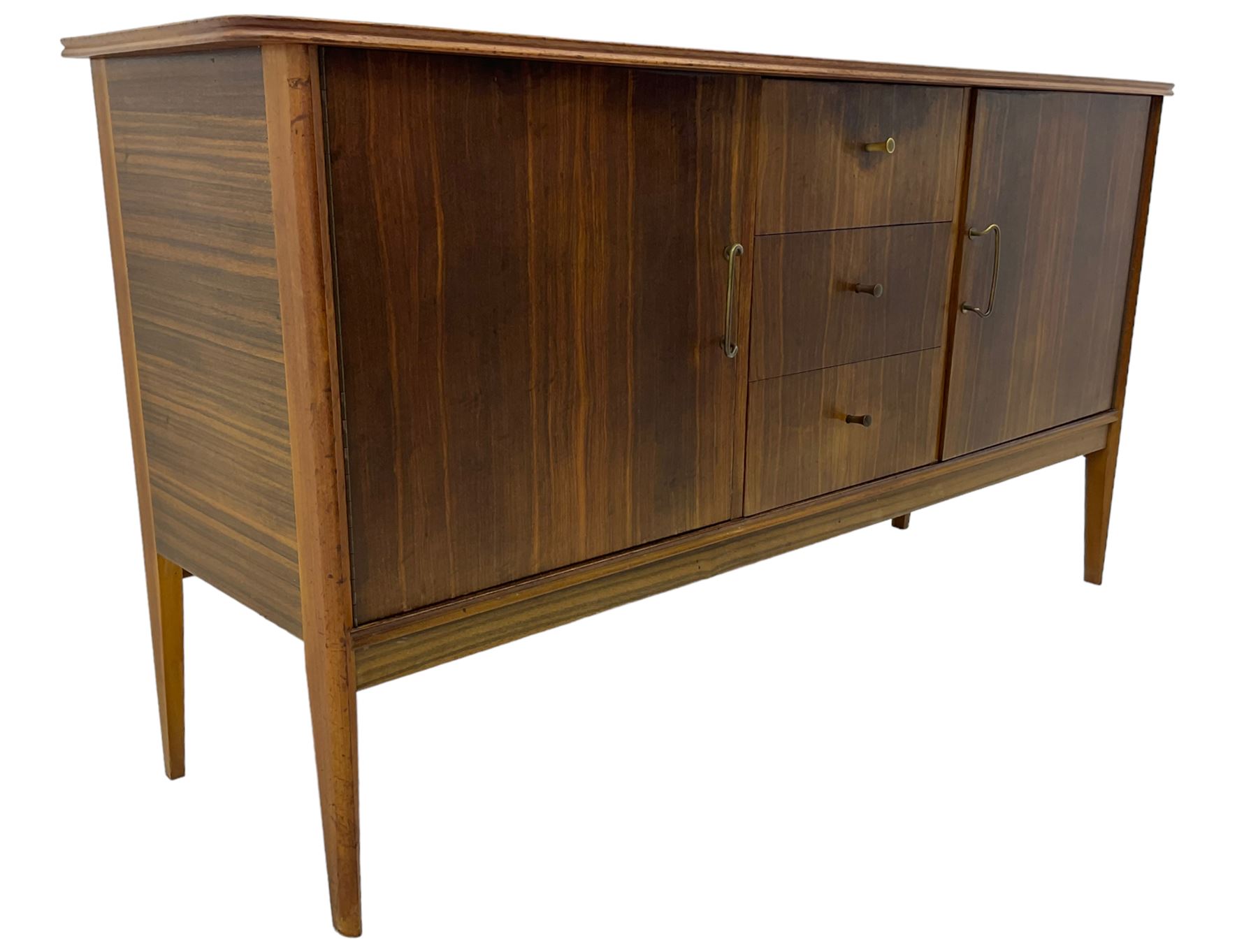 Peter Hayward for Vanson - mid-20th century teak sideboard, rectangular top with rounded corners over three central drawers, flanked by two cupboard doors enclosing shelves, raised on tapered supports
