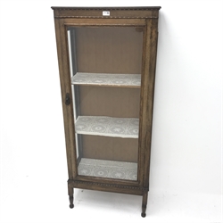 Early to mid 20th century oak glazed display cabinet, egg and dart detailing, single door enclosing two lined shelves, turned supports, W62cm, H149cm, D32cm