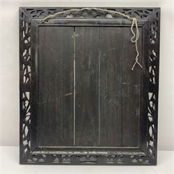 Framed silk embroidered panel decorated with a peacock design in silver and gilt wire embroidery, within a carved ebonised frame, H58cm, W51cm 
