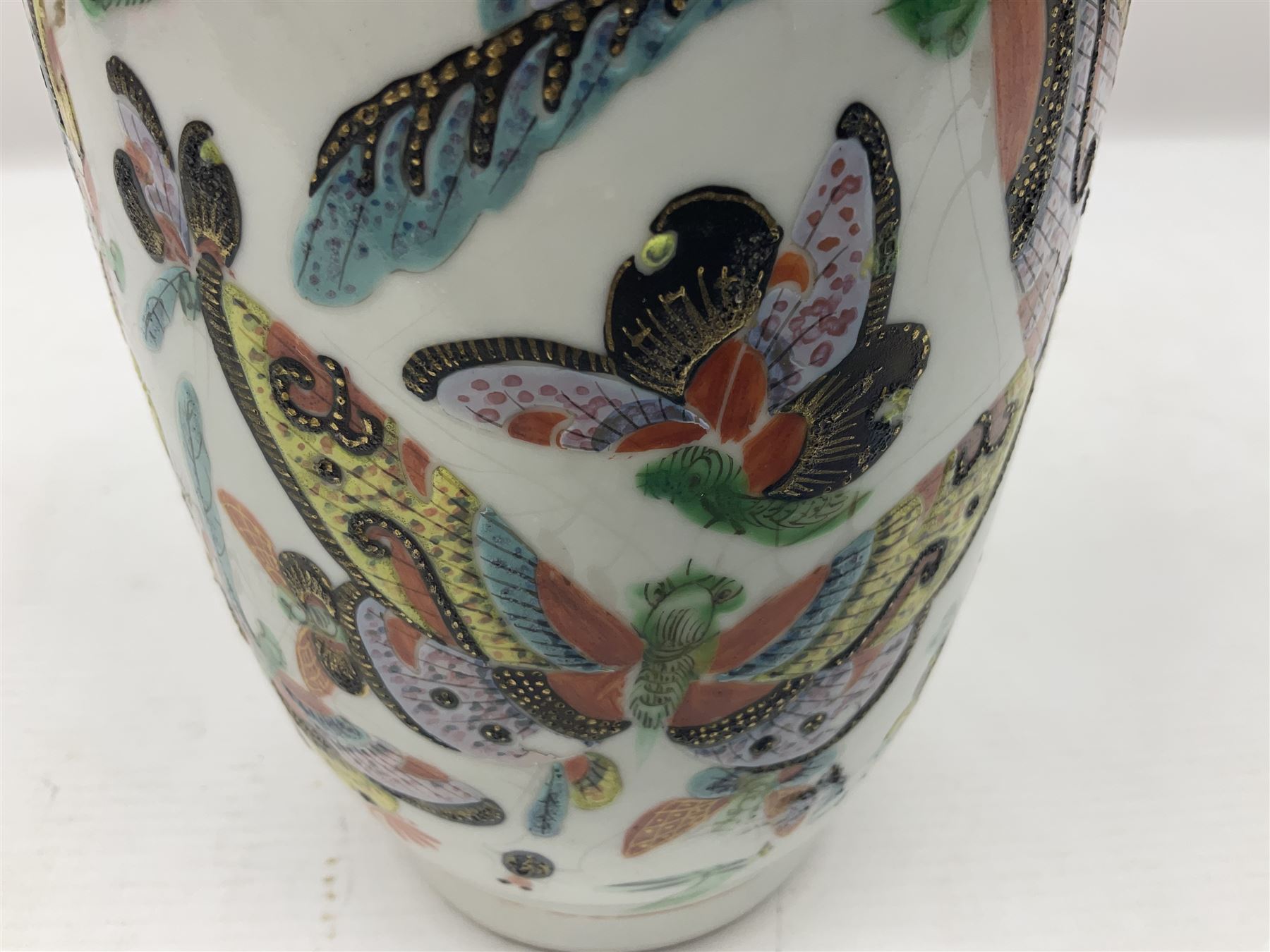 19th century Chinese Canton vase of slender baluster form, decorated with butterflies and floral panel to the neck, H30cm