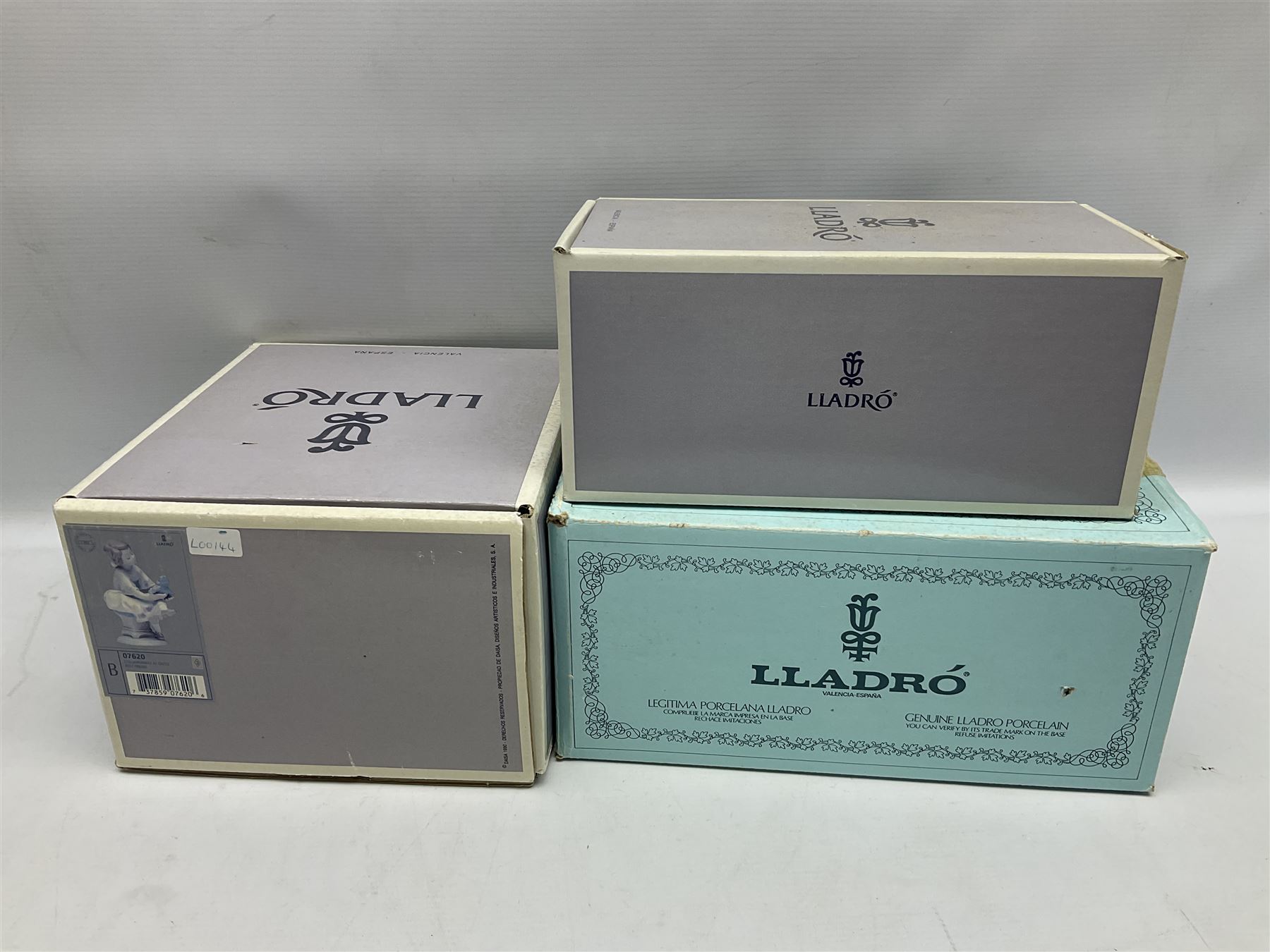 Six Lladro figures, comprising Naughty Dog no 4982, Best Friend 7620 and My Buddy no 7609, Kitty Confrontation no 1442, It Wasn't Me no 7672 and Rabbit Eating no 4772, three with original boxes, largest example H22cm