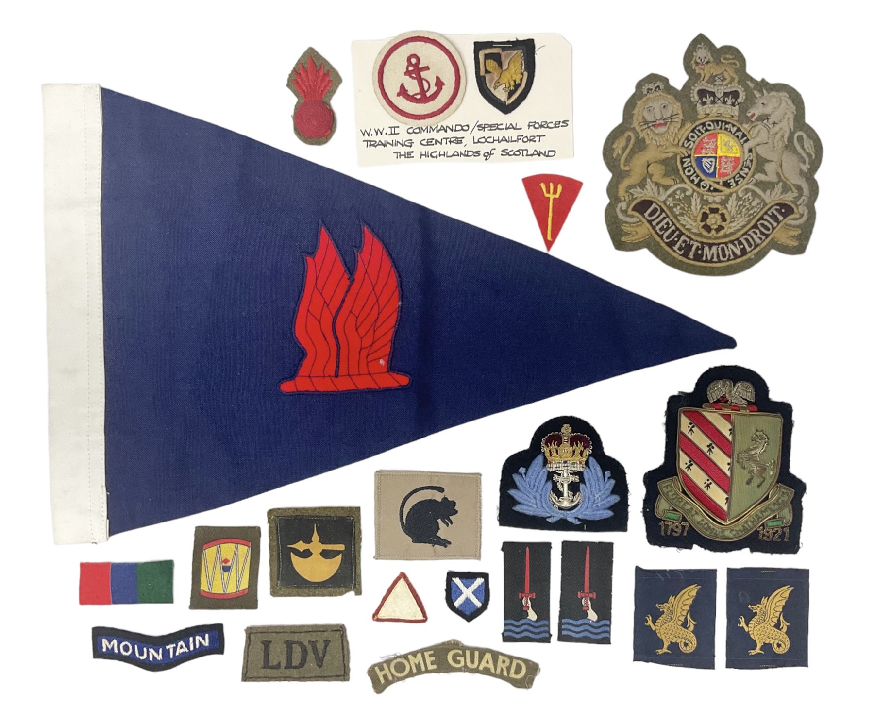 Royal Arms cloth arm adge as worn by Regimental Serjeant-Majors in Foot Guards; naval cap badge; WW2 Commando/Special Forces cloth badges; Home Guard and LDV shoulder titles; and other cloth badges including armoured division, 45th and 77th division, 52nd Lowland Mountain division etc; and 24th Infantry Brigade airmobile pennant