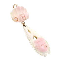 19th century gold Conch shell pendant, carved bust portrait of a child, within a foliate setting, suspending from a conch shell design pendant