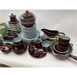 Denby dinner and tea wares, comprising largely Homestead pattern, to include dinner plates, salad plates, serving plates and dishes, bowls, teapot, coffee pot, hot water pot, teacups, saucers, milk jug, etc. 