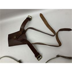 British Army General Staff officer's peaked cap by Herbert Johnson London in Moss Bros. delivery box; two officer's Sam Browne leather belts; leather pistol holster and sword hanger; pair of leather gloves and pair of spurs
