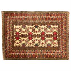 North East Persian Gochan hand-knotted rug, ivory field decorated with a vertical column o...