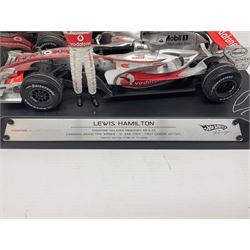 Mattel Hot Wheels 1:18 scale die-cast racing car - Vodaphone McLaren Mercedes; boxed with stand