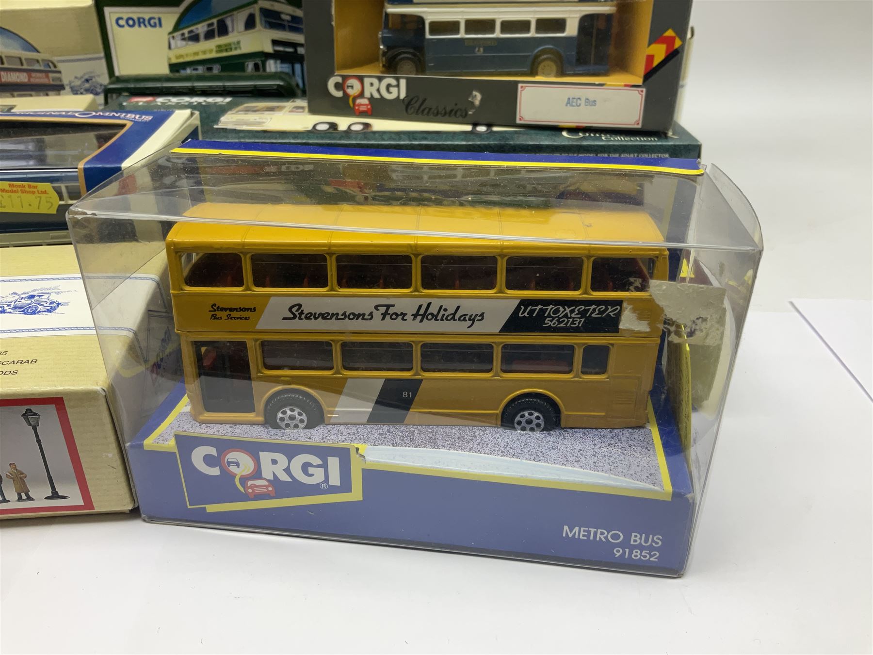 Corgi - twenty eight modern die-cast model coaches, buses and wagons to include Corgi Classics 35305, 96991, 97002, two 97108, 97208, 97267, 97335, 97871 and 98162; limited edition sets D949/26, 97107 and 97185; The Yorkshire Rider Series 91700, 91853, 91858 and 91862; all but one in original boxes or perspex display cases, most with certificates (27)
