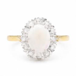 18ct gold opal and diamond cluster ring, oval cabochon cut opal surrounded by twelve singl...