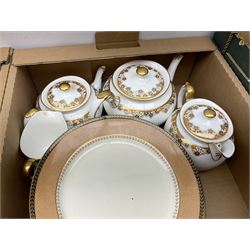 Paragon tea and coffee wares decorated with gilt and flowers, together with Bisto Oriental Ivory dinnerwares to include lidded tureens, dinner plates, jugs etc 