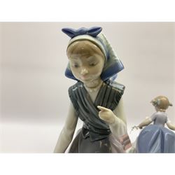 Three Lladro figures, comprising Hurry Now no 5503, Josephine feeding Duck no 5201 and Aracely with Pet Duck no 5202, all with original boxes, largest example H25cm