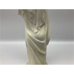 Parian ware figure of a woman in classical dress with one hand raised, H34cm