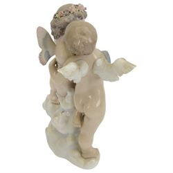 Lladro figure, Heaven and Earth, modelled as two cherubs, no 1824, with original box 