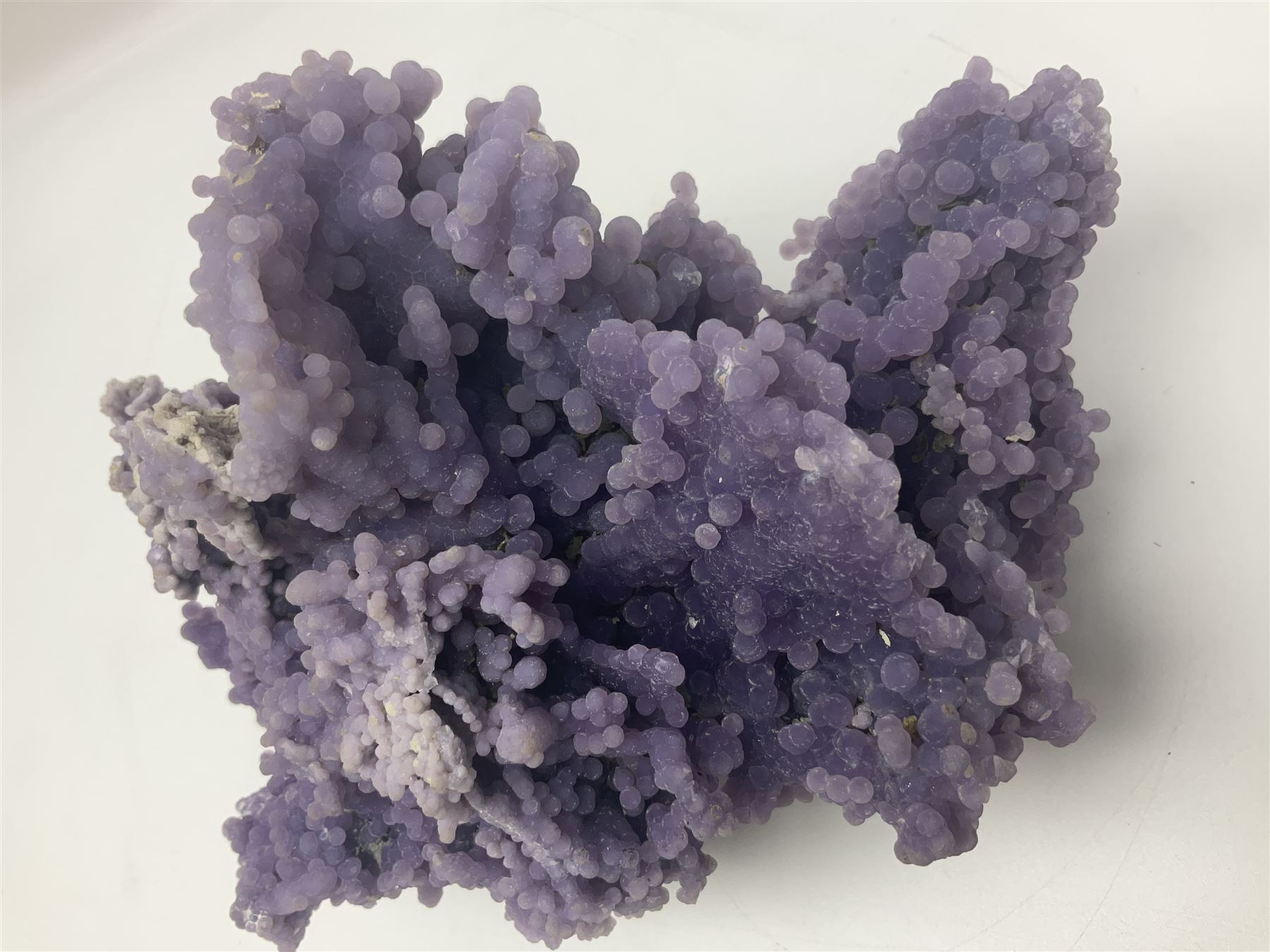 Grape agate cluster, formed of spherical quartz crystals, in purple tones, H15cm, L20cm