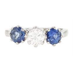 Platinum three stone round cut diamond and cornflower blue sapphire ring, Birmingham 1995,...