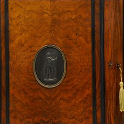 Lamb of Manchester (est. 1843) - Victorian Aesthetic Movement inlaid figured and burr walnut inverted-breakfront credenza, the shaped rectangular top with ebony banding and boxwood stringing, the frieze applied with bronze mounts decorated with foliate and scroll motifs, fitted with central glazed door flanked by panelled doors with central oval metal plaques depicting Classical Muses with lyre, the flanking canted uprights applied with caryatid maidens holding torches, acanthus terminal over skirted base