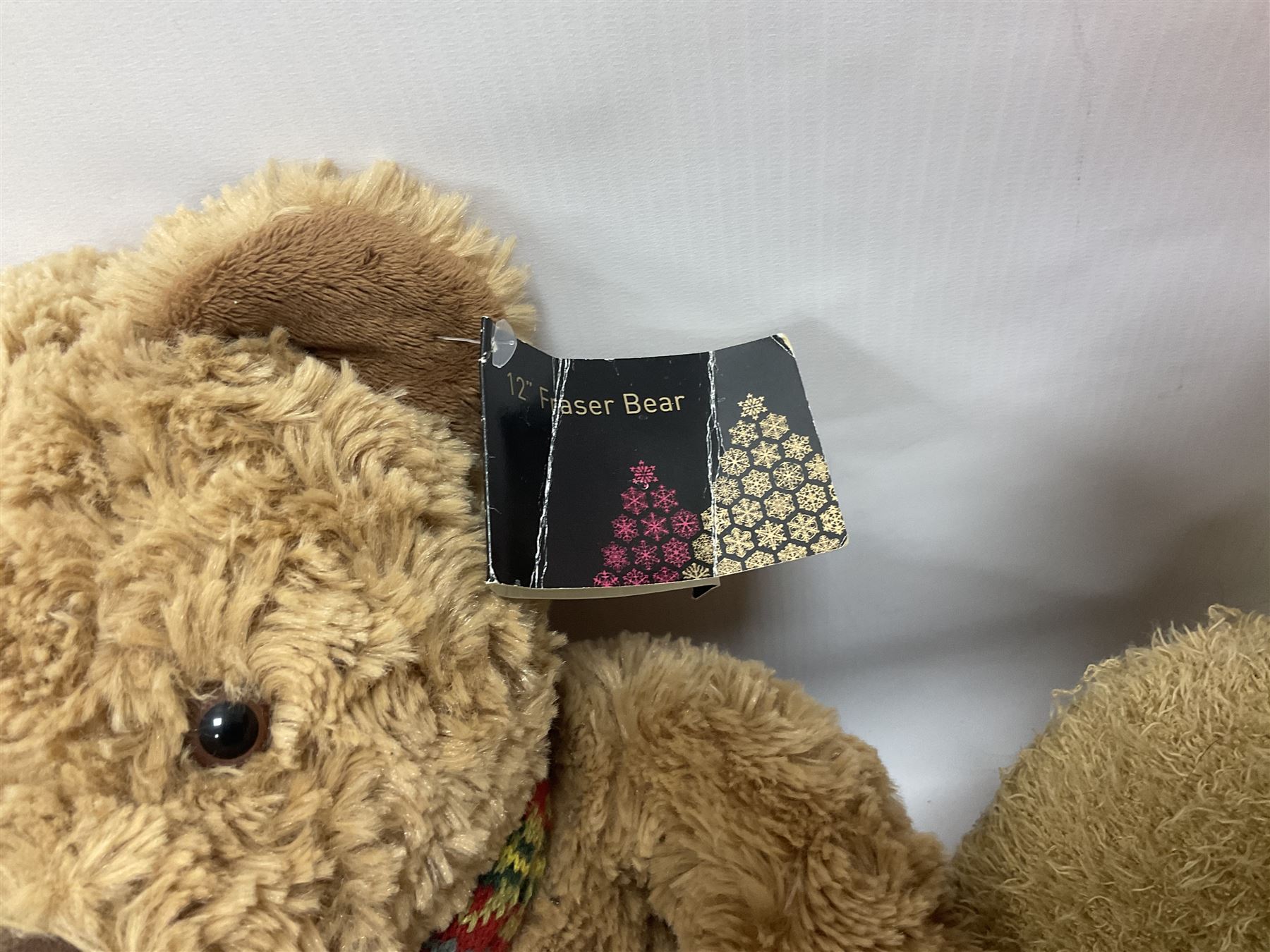 Eight annual Fraser Bears, by House of Fraser, dating between 2004 and 2011, tallest H46cm